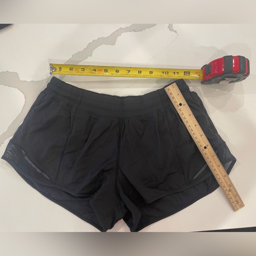 Lululemon black women’s shorts with liner.  Size estimated M